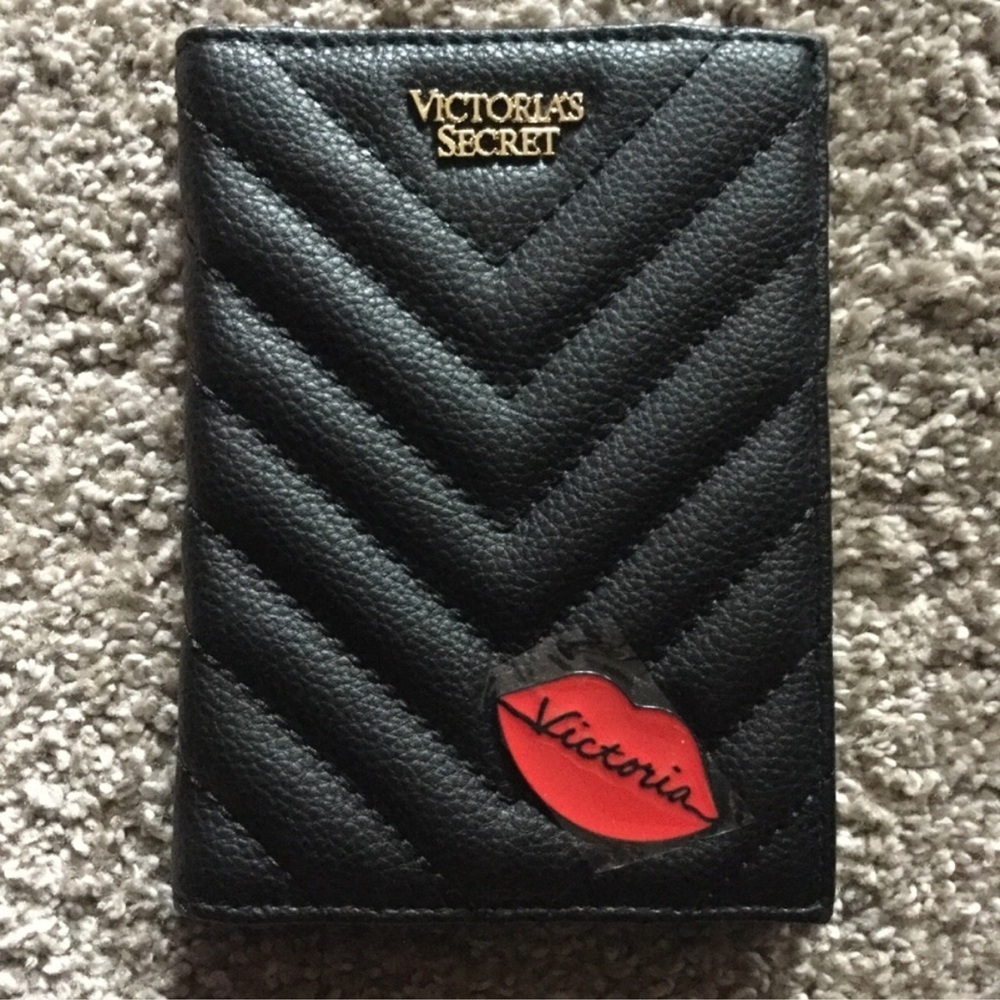 🆕VS Black quilted passport cover.